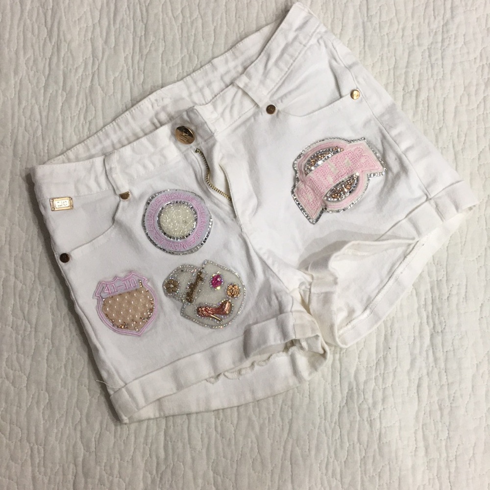 Gorgeous white shorts with jewels and patches😍🤩